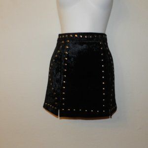 Crushed velvet with stud accents, back zip, hot pink lined mini skirt, black